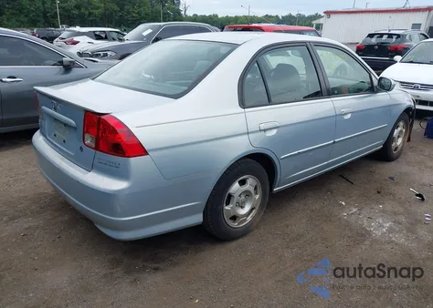 2004 Honda Civic Hybrid from USA, damaged, VIN JHMES96664S000397